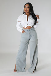 Jean jambe détachable avec des boutons sur le côté