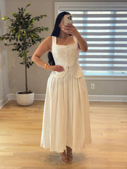 Ensemble jupe plissée et top sans manches blanc