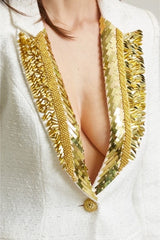 Blazer col pailleté doré