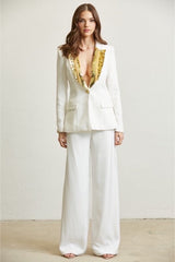 Blazer col pailleté doré