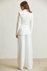 Blazer col pailleté doré