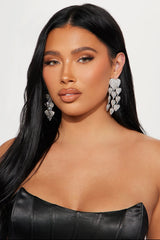 Boucle d’oreille Argentée à strass forme en Coeur