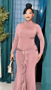 Robe longue moulante à manche longue détail boucle