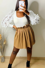 Jupe patineuse  plissée en simili cuir noir