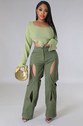 Pantalon olive Adja Diallo taille haute extensible avec découpe jambe large