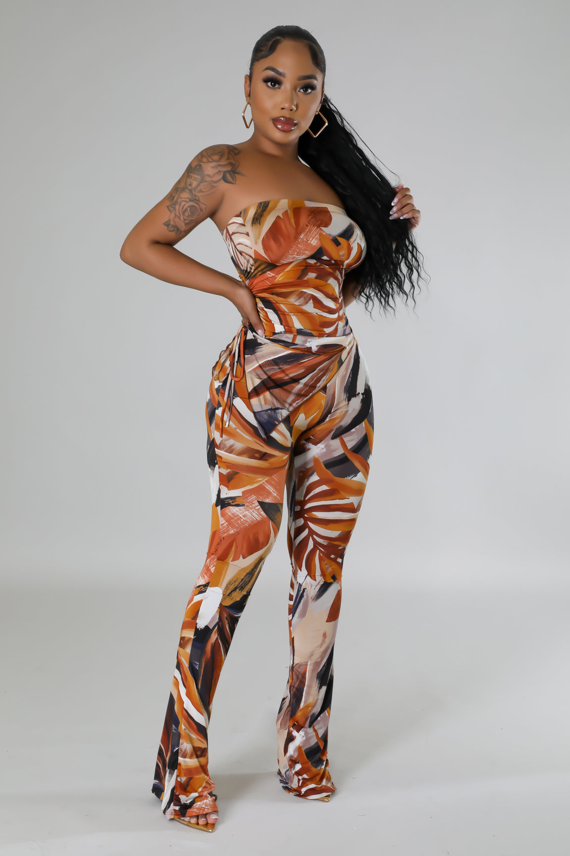 Ensemble pantalon extensible et top asymétrique taille haute