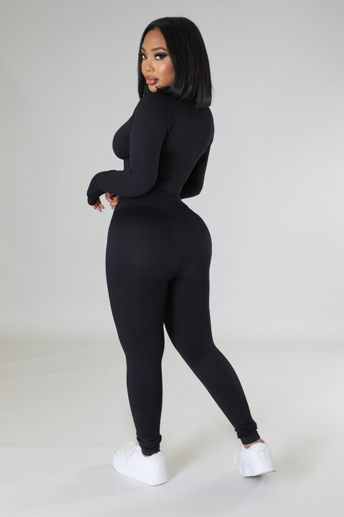 Ensemble deux pièces legging et top col montant à manche longue